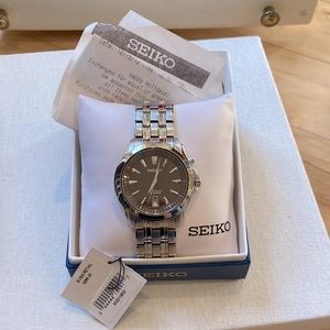 Men’s Silver Seiko watch with brown face